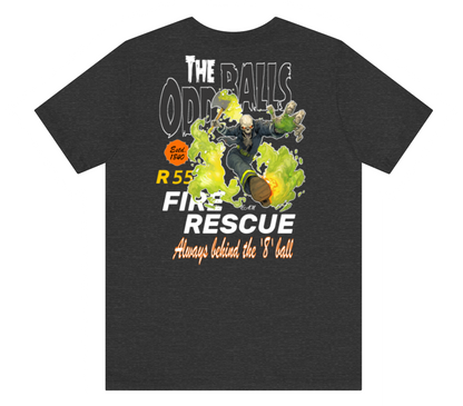 A dark heather gray t-shirt featuring a graphic print of a firefighter with a football and the text 'THE ODD BALLS FIRE RESCUE' on a plain white background.